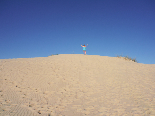 Karen at the top of a sand hill,